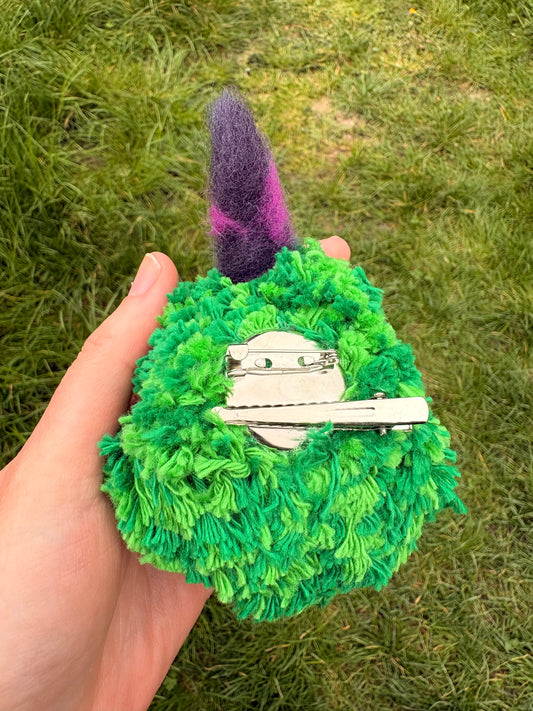 Broche-barrette dragon avec une corne